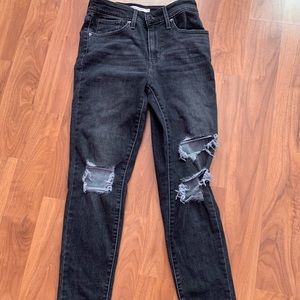 Levi’s ripped black 721 skinny jeans